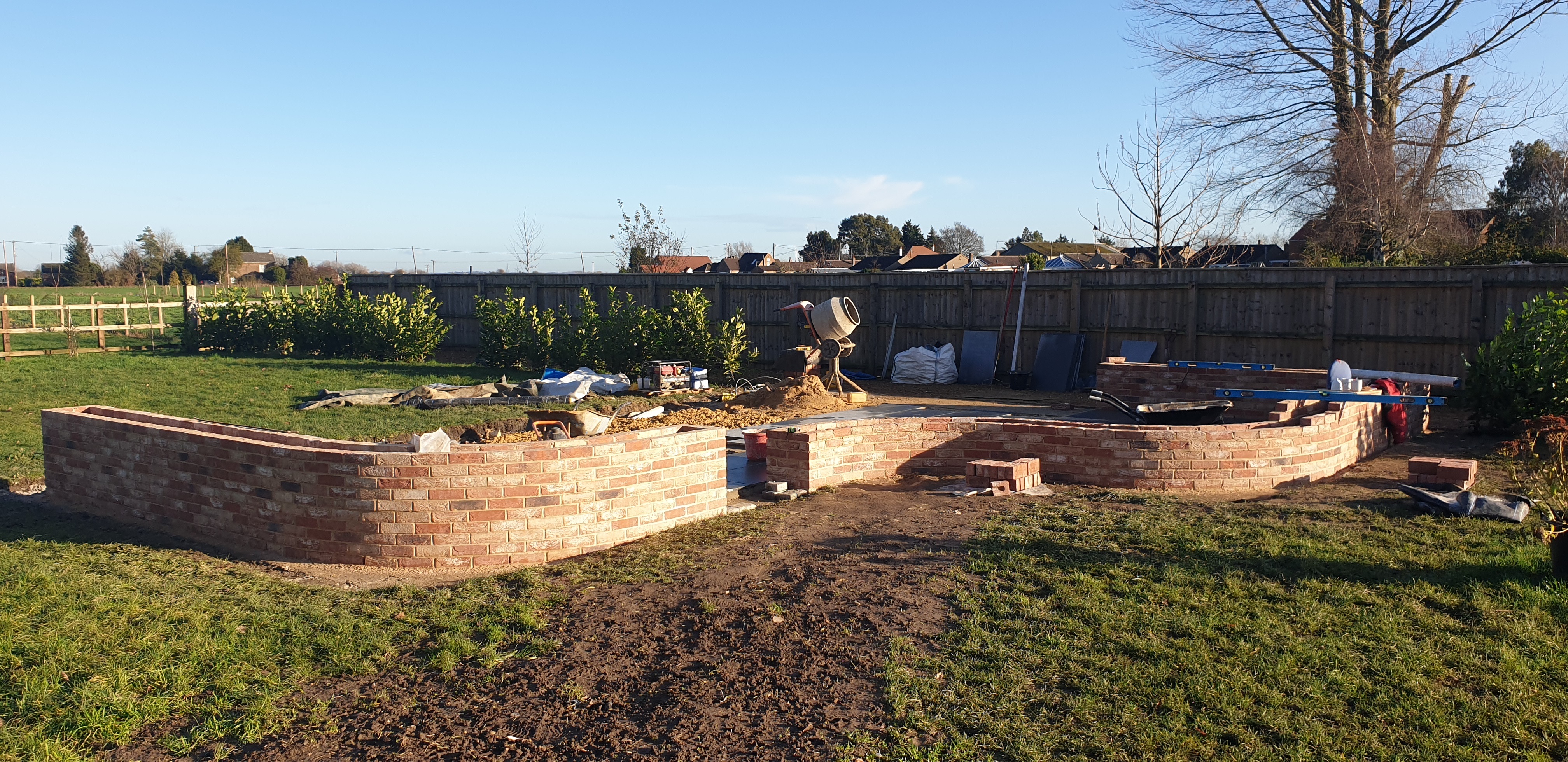 Curved planting wall brickwork